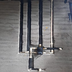 This image showcases Plumbing, which is a system of pipes and fixtures that deliver water and remove waste within a building